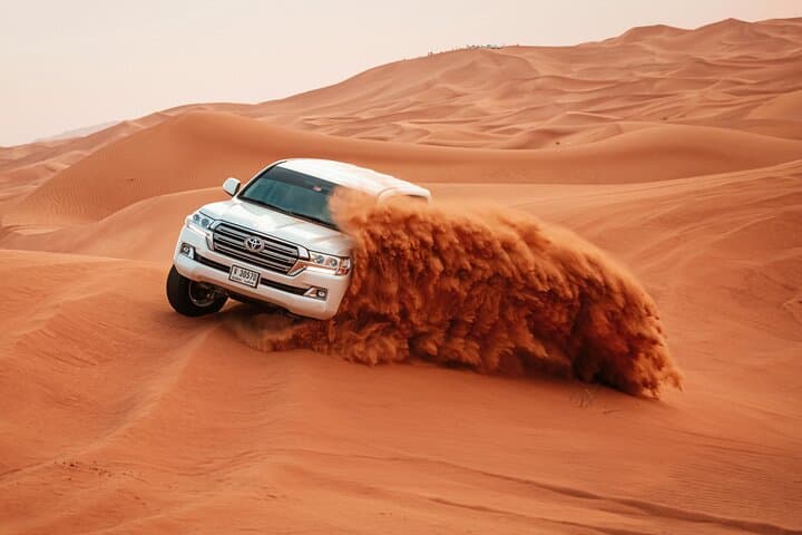 Sunset Dune Bashing & Bedouin Nights: Dubai Desert Safari with BBQ and Live Shows photo 1