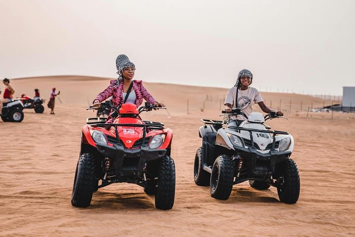 Dubai Desert Safari: 60-Minute ATV Quad Ride, Camel Ride & BBQ Under the Stars photo 1