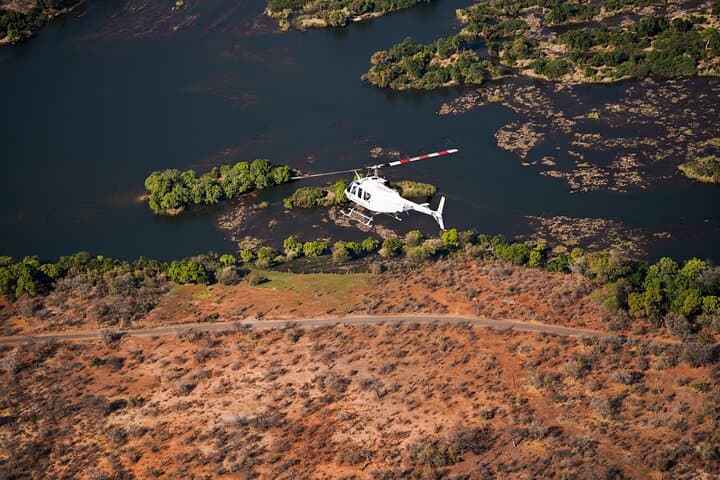 Victoria Falls Helicopter Flight, Guided Rainforest Walk & Zambezi Sunset Cruise photo 2