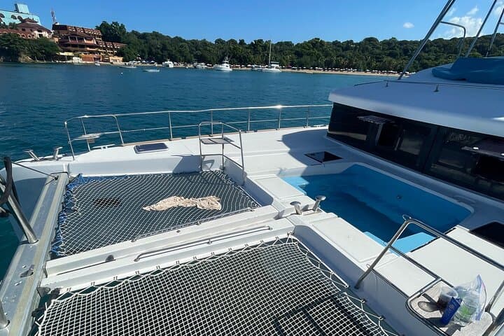 Private Catamaran Charter from Amber Cove to Taino Bay — Snorkel, Jacuzzi & BBQ photo 3