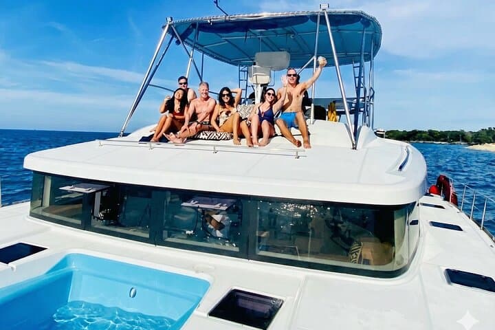 Private Catamaran Charter from Amber Cove to Taino Bay — Snorkel, Jacuzzi & BBQ photo 1
