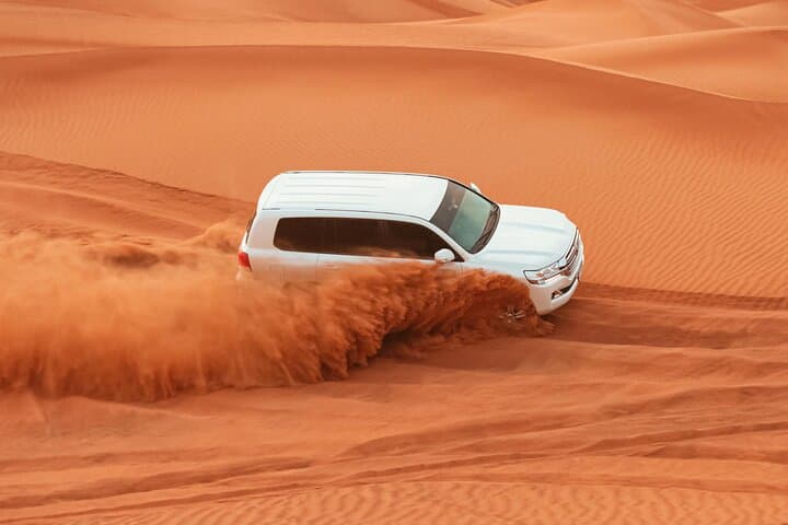 Aqua Package Dubai: Jet Ski, Parasailing & VIP Desert Safari with BBQ photo 2