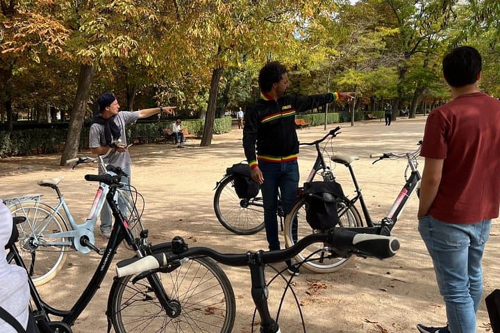 Madrid Bike Tour: Royal Squares, Retiro & Madroño Tasting photo 3