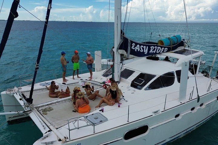 Catamaran Sunset and Snorkel off Isla Mujeres — 4‑Hour Caribbean Cruise photo 1