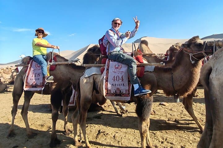 Dunhuang Day Tour: Mogao Caves, Singing Sand Mountain & Crescent Spring