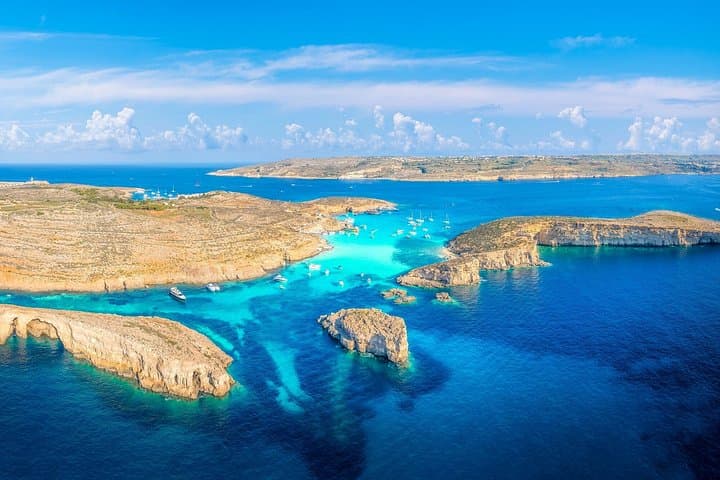 Blue Lagoons Discovery: Private Boat Tour from Gozo to Comino and Hidden Bays photo 2
