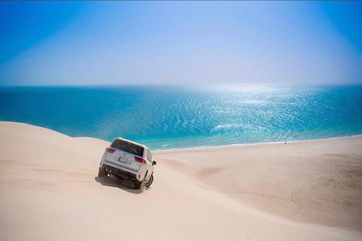 Doha Desert Escape: Gentle Dune Safari, Camel Ride & Sandboarding photo 2