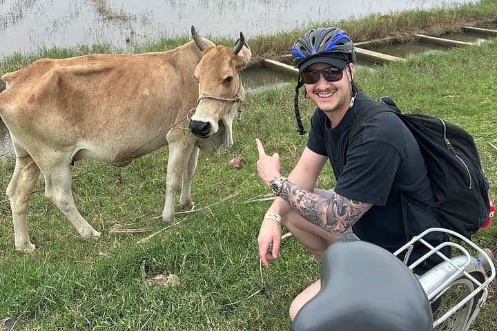 Hoi An Countryside Cycling & Basket Boat Experience — Local Lunch with Water Buffalo photo 1