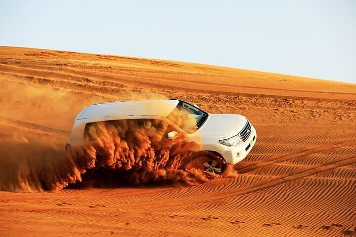 Doha Desert Safari to Inland Sea — Dune Bashing, Camel Rides & Sunset Views photo 1