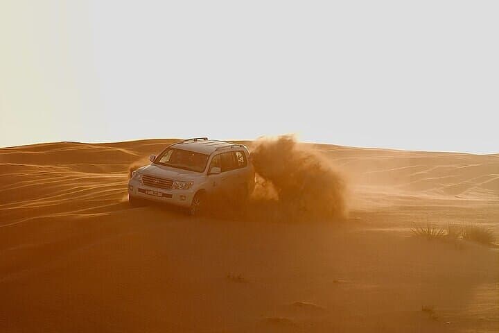 Sunrise or Sunset Desert Safari in Qatar: 4x4 Dune Bashing, Sandboarding & Camel Ride photo 2