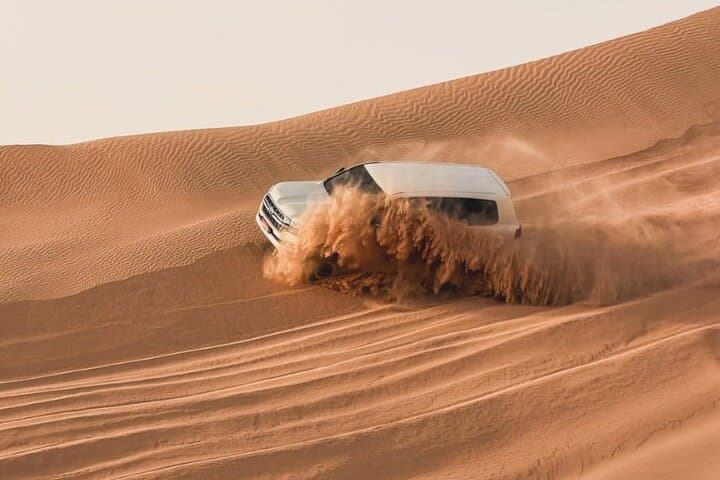 VIP Evening Desert Safari in Dubai: Red Dunes Sunset, Dune Bashing & BBQ