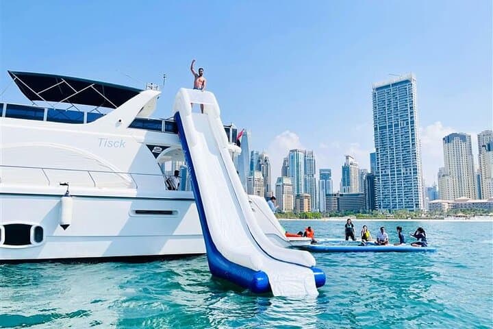 Dubai Harbour Yacht Cruise with Waterslides & BBQ — Palm Jumeirah Views photo 1