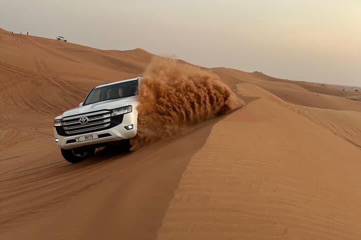 Evening Dubai Desert Safari: Quad Bike, Dune Bashing & Bedouin Camp Experience photo 4