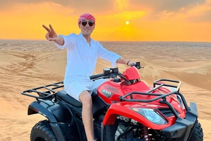 Dubai Desert Quad Bike Safari — Dune Bashing, BBQ & Live Entertainment photo 1
