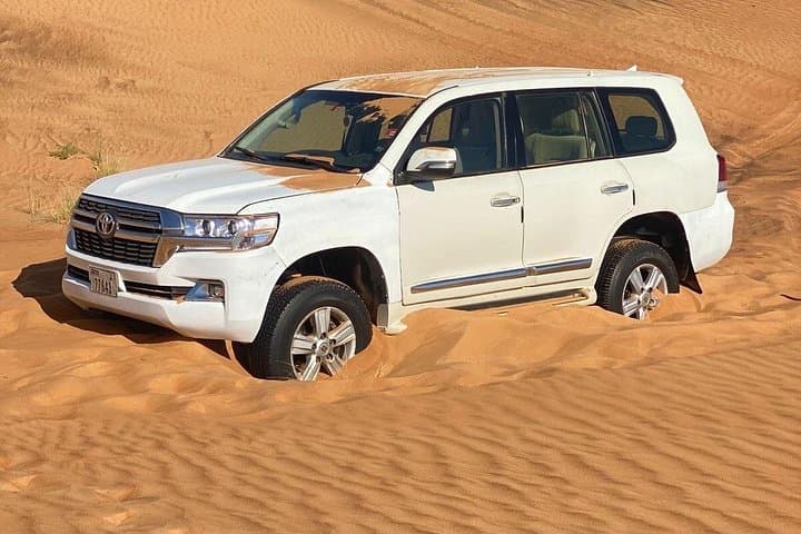 Morning Red Dunes Safari in Dubai: Camel Rides, Sandboarding & Sunrise Photos photo 1
