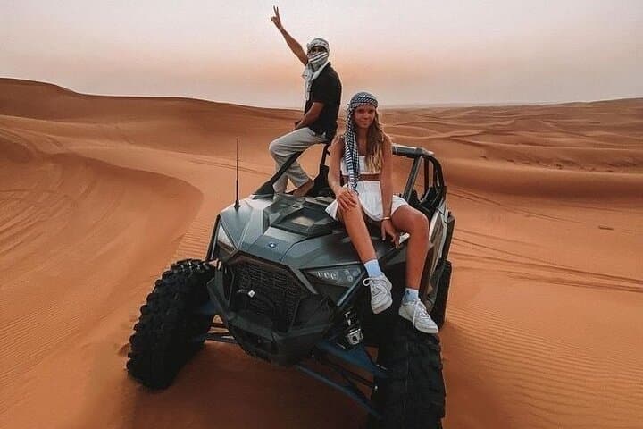 Drive Dubai's Red Dunes: 1000cc Buggy Ride with Camel & Falcon Photo
