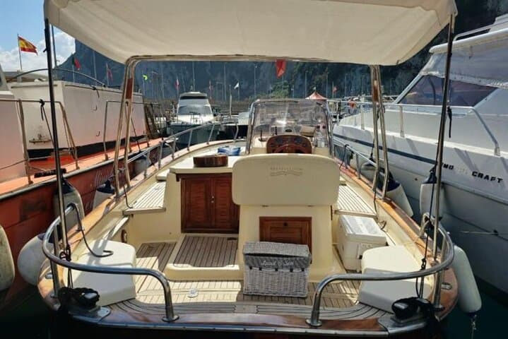 Private Capri Boat Tour: Swim the Blue Grotto, Faraglioni & Secret Bays photo 4