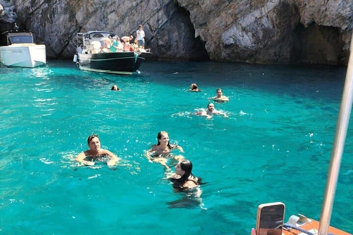 Private Capri Boat Tour: Swim the Blue Grotto, Faraglioni & Secret Bays photo 3