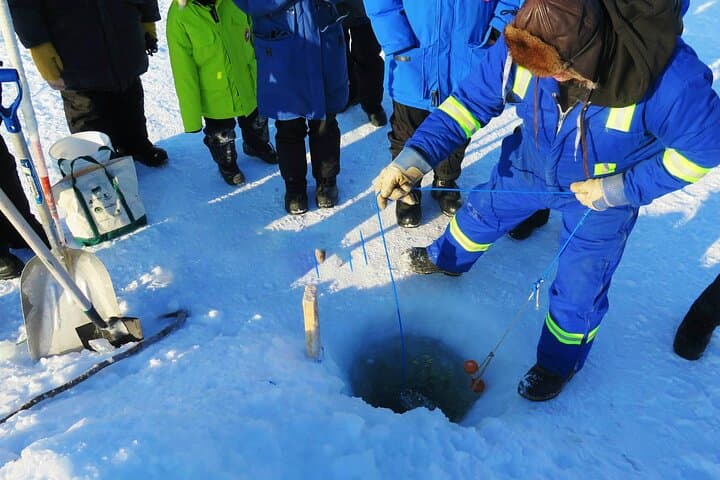 Traditional Indigenous Ice Fishing on Great Slave Lake | Yellowknife Winter Experience photo 3