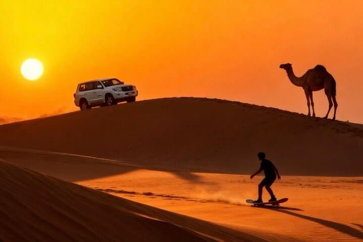 Doha Desert Safari & Khor Al Adaid Half-Day: Dune Bashing, Camel Ride & Sandboarding