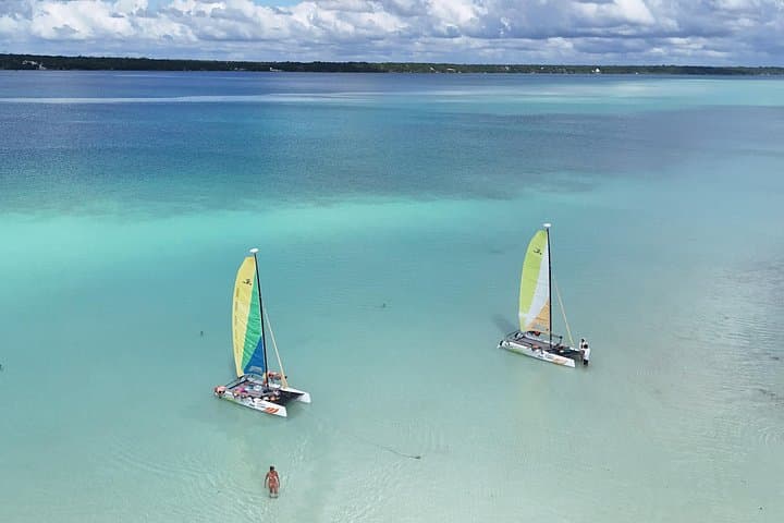 Private Eco Sailing Tour on Bacalar Lagoon — French-Speaking Catamaran Through Cenotes & Stromatolites photo 1