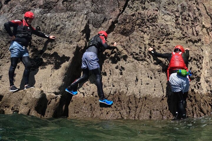 Coasteering Near Tenby: Lydstep Cliff Jumps & Sea Cave Adventure photo 5