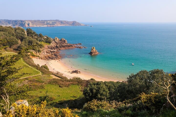 Full-Day Jersey Coast & Countryside Private Shore Tour — Castles, Cliffs & WWII Relics photo 2
