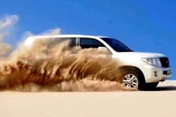 Doha Full-Day Desert Safari: Dune Bashing, Camel Rides & Inland Sea Experience photo 2