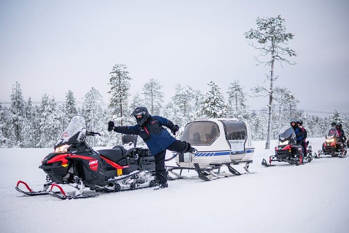 Family Snowmobile Safari in Rovaniemi: Heated Sledges & Arctic Forest Ride photo 1