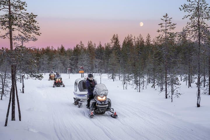 Family Snowmobile Safari in Rovaniemi: Heated Sledges & Arctic Forest Ride photo 3
