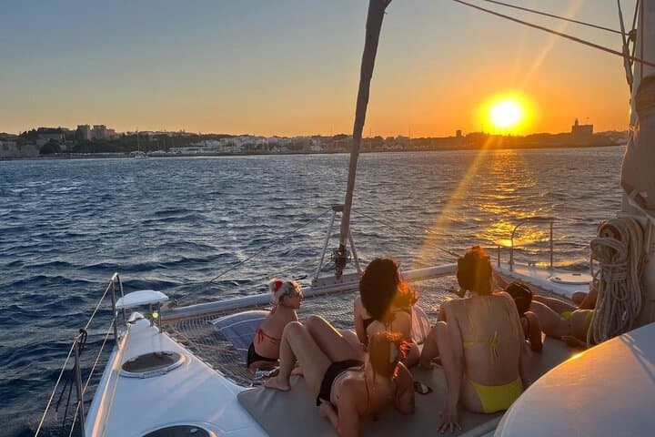 Sunset Catamaran Cruise in Rhodes: Aegean Evening Sail with Drinks