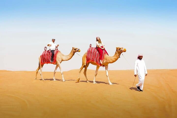 Dubai Red Dunes Buggy Dune Bashing, Sandboarding, Camel Ride & Desert Show photo 3