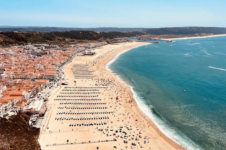 Private Transfer from Porto to Lisbon with Stops in Aveiro, Nazaré, Óbidos & Coimbra photo 1
