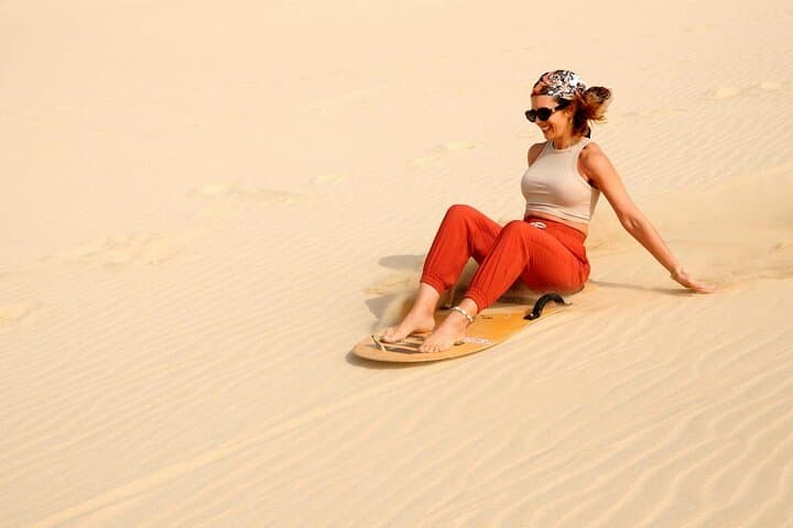 Evening Dubai Desert Safari: Dune Bashing, Camel Rides & BBQ Camp Experience