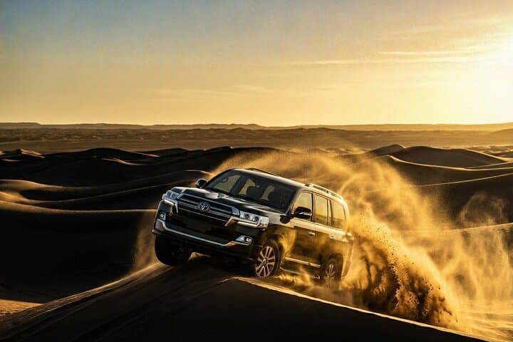 Evening Dubai Desert Safari: Dune Bashing, Camel Rides & BBQ Camp Experience photo 2