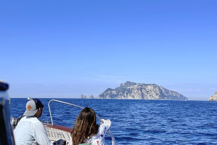 Capri Boat Tour from Positano: Blue Grotto, Snorkeling & Sunset at Li Galli photo 4
