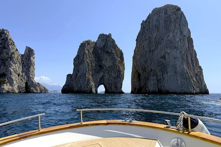 Capri Boat Tour from Positano: Blue Grotto, Snorkeling & Sunset at Li Galli