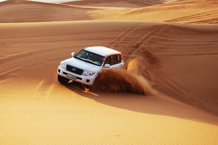 Red Dunes Desert Safari: Dubai Dune Bashing, Camel Ride & BBQ Under the Stars photo 1