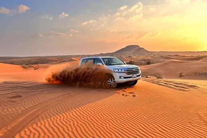 Dubai Half-Day Red Dunes Desert Safari with Camel Ride and Sandboarding