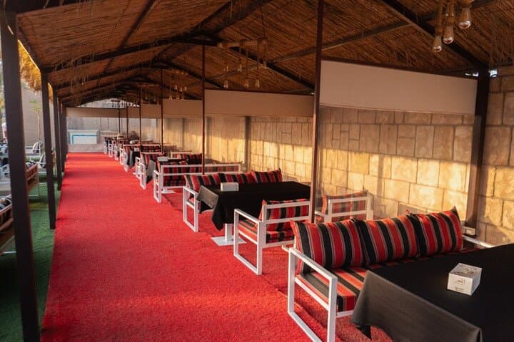 Evening Dubai Desert Safari: Dune Bashing, BBQ Dinner & Live Shows from Meeting Point photo 6