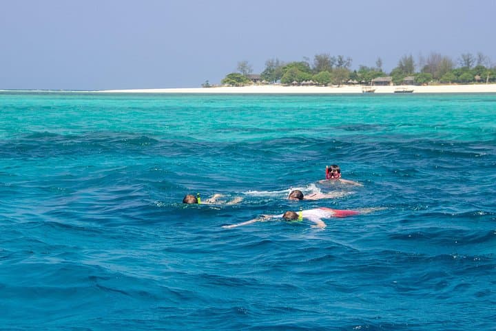 Stone Town to Bawe: Scenic Coastal Cruise, Snorkel & Sandbank BBQ photo 1