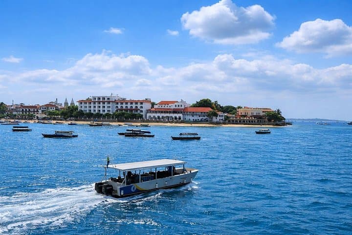 Stone Town to Bawe: Scenic Coastal Cruise, Snorkel & Sandbank BBQ photo 3