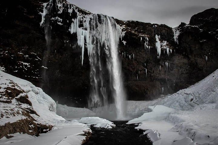 South Coast Waterfalls, Sólheimajökull Glacier & Reynisfjara Black Sand Day Tour from Reykjavik
