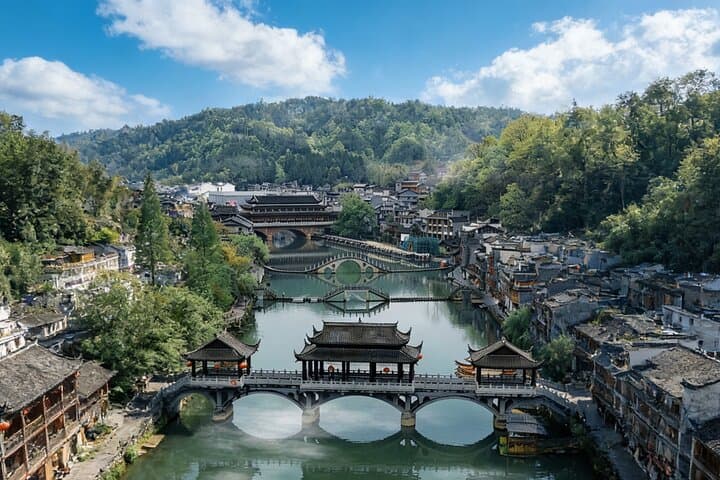 Furong & Fenghuang Day Tour from Zhangjiajie — Waterfalls, Stilt Houses & River Cruises