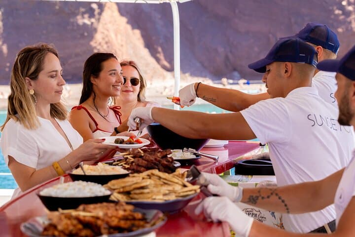 Santorini Catamaran Cruise with BBQ, Hot Springs & Snorkel — Skip the Cable Car photo 3