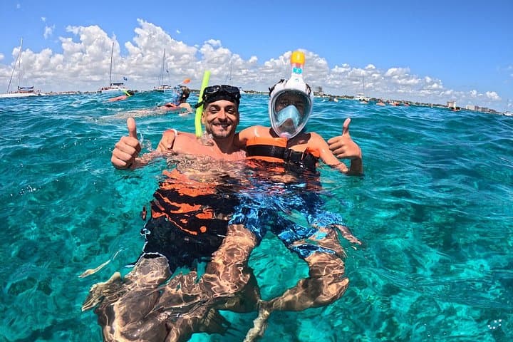 Sunset Catamaran to Isla Mujeres: Snorkel Reefs, Beach Club & Playa Norte photo 1