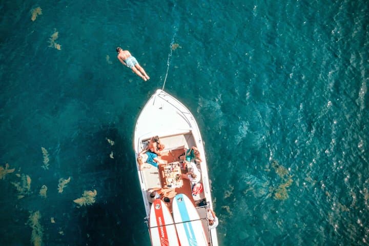 Sesimbra Boat Tour with SUP & Snorkeling — Explore Arrábida's Hidden Coves