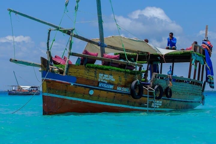 Wasini Dolphin Day Tour from Diani Beach — Kisite Marine Park Snorkel & Shimoni Caves