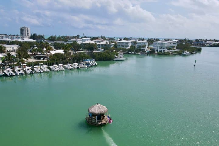 Private Tiki Boat Cruise in the Florida Keys — 1.5-Hour Harbor & Swim photo 1