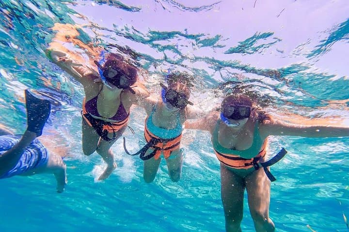 Isla Mujeres Dancer Cruise: Catamaran Party with Snorkeling, Lunch & Open Bar photo 4